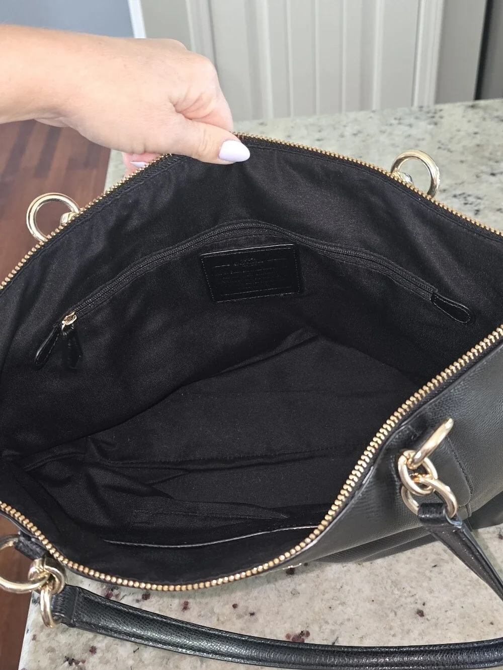 Coach Black Leather Tote with Gold Accents
